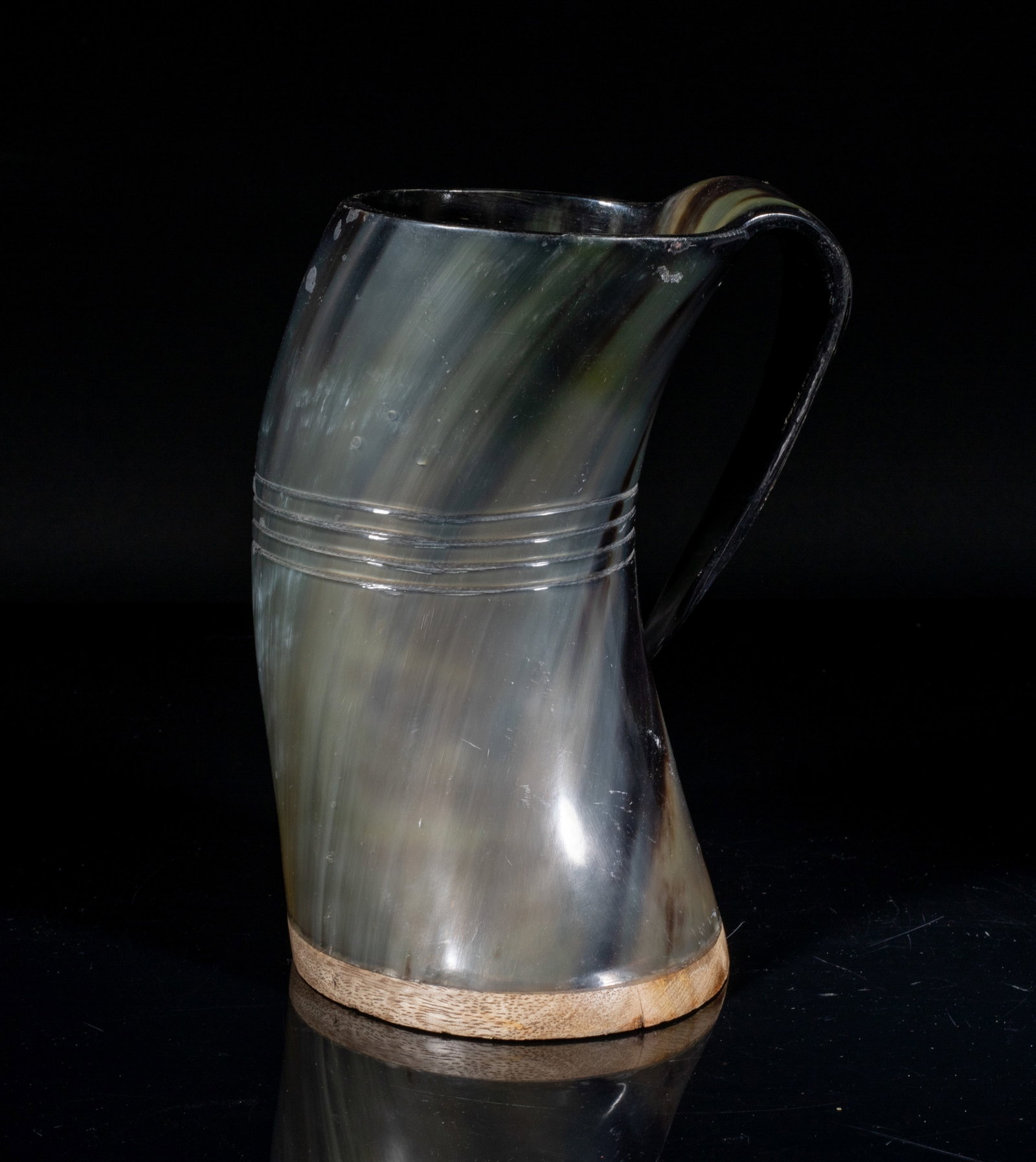Hand Made Buffalo Large Mug: Hand made buffalo mug with a wood base, marked NORSE TRADESMAN. Approx. 7.5*5.5*5.2 inch.