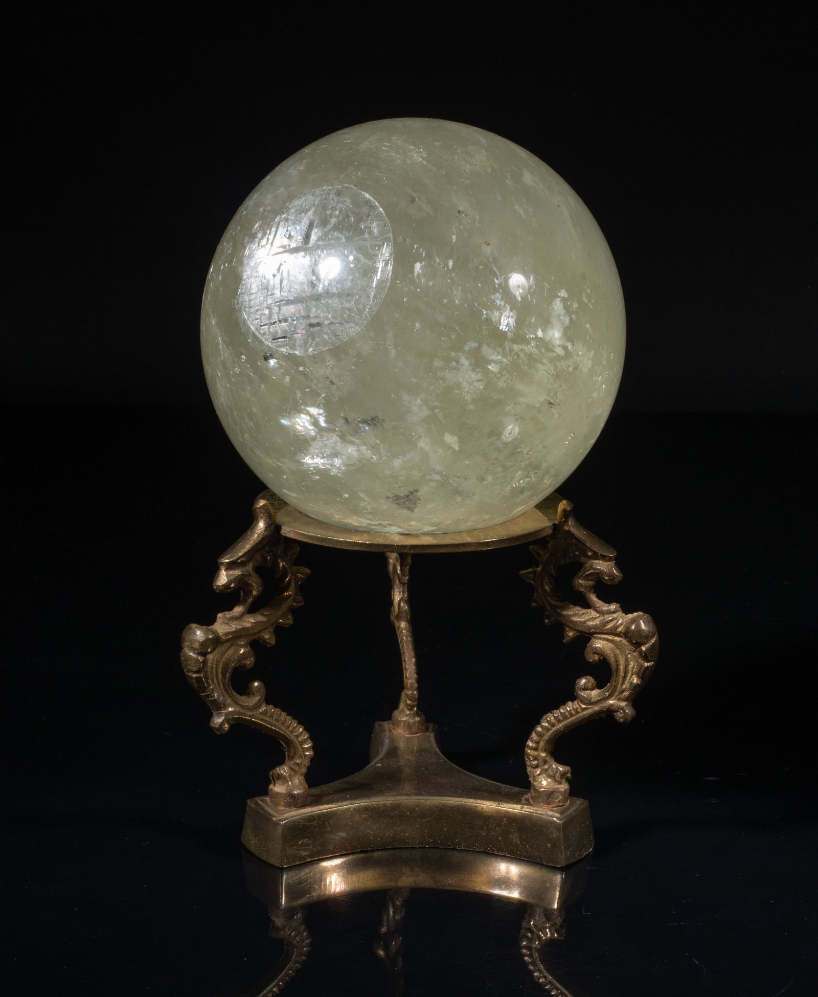 France Golden Crystal Ball Sculpture: French type golden crystal ball sculpture, with a tall stand cast with three dragons. Approx. 4 inch D (ball size).