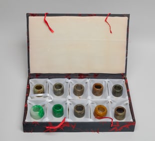 Estate Box of Chinese Jade/ Stone Thumb Rings