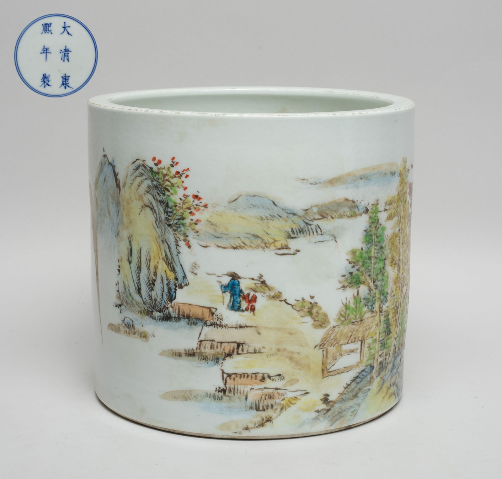Large Chinese Famille Rose Porcelain Brush Pot: The cylindrical body painted with a scholar appreciating landscape scene, inscribed with related passages, the bottom marked with six characters enclosed in double circles. Approx. 7.4*6.8 inch.