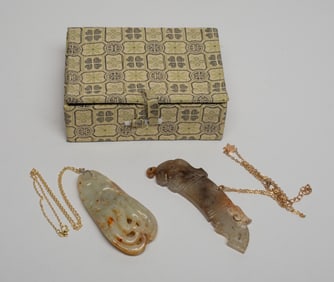 Two Chinese Russet Jade Pendants
