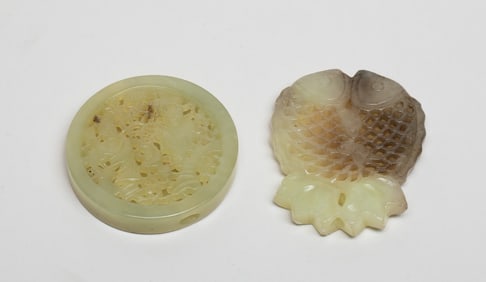Two Chinese Jade Open Works Pendants