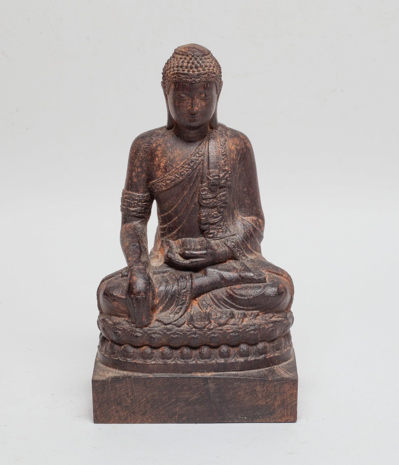 Chinese Export Agarwood Sculpture of Buddha: The Buddha carved seated in bhumisparsa mudra on a double lotus base, dressed in a long flowing robe, slightly fragrant. Approx. 7.2*4.05*2.85 inch, 692 gram.