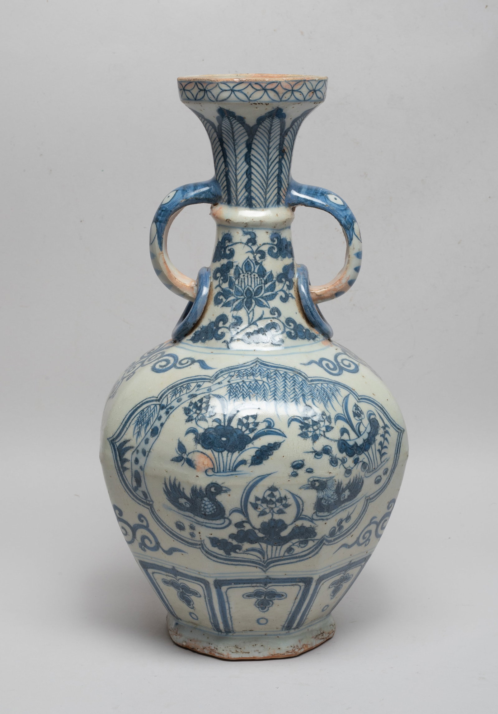 Chinese Shipwreck Type Porcelain Vase: Of octagonal section, the body painted with two ruyi-head shaped medallions of mandarin ducks, lotus and willow tree, above a band of upright lappets, the neck decorated with bands of overlapping leav