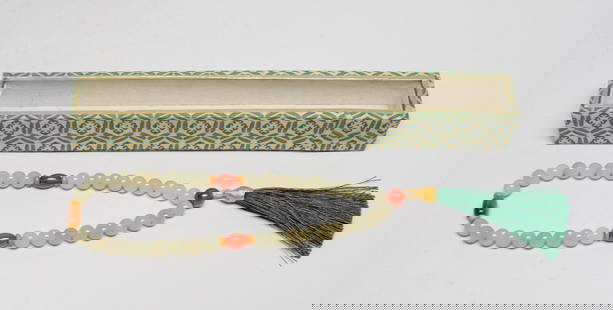 Chinese Export Jade Prayer Beads: One string of prayer beads comprised of pale celadon jade beads and gemstone beads, with green tassel, with box. Approx. 14 inch L (string size). The Estate of The Store Closed Sale, Little Tokyo, Los