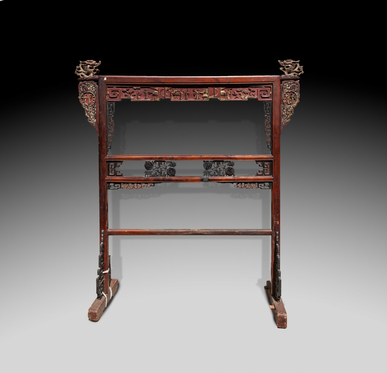 Antique Chinese Wood Furniture: Antique Chinese wood furniture, carved with figures on the top, reticulated with flowers on the middle section, flanked by a pair of dragons. Approx. 68.5*62.5*18.25 inch.
