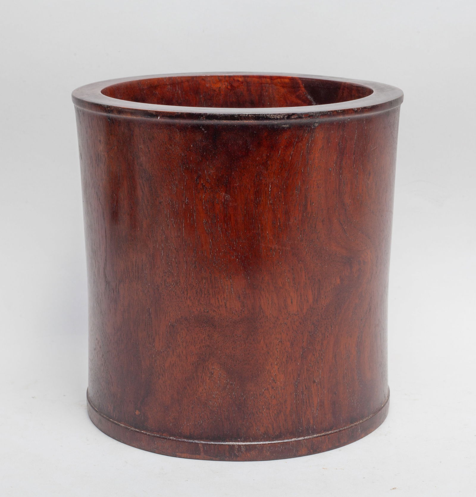 Chinese Carved Wood Brush Pot: Chinese wood brush pot of cylindrical form, the bottom pierced with a large circular aperture and set with a stopper. Approx. 7.5*7.4 inch.
