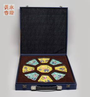 Large Set Chinese Export Porcelain Plates: Nine plates as a set, each enameled and painted on the interior with grapes and flowers on yellow or turquoise glazed ground, the bottom marked with four characters, with box. Approx. 4.6inch D (large