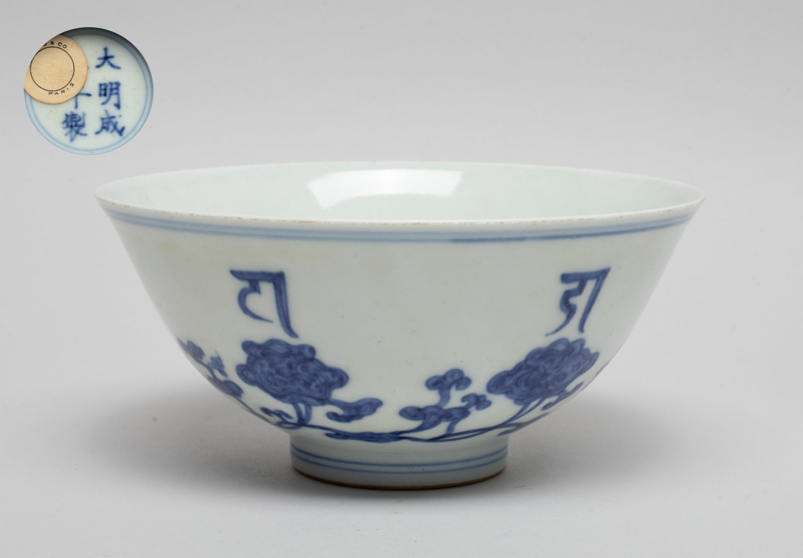 Chinese Export Blue & White Porcelain Bowl: The bowl exterior painted with continuous lingzhi sprays, inscribed with mythical characters, the bottom marked with six characters enclosed in double circles. Approx. 5.8*2.7 inch.