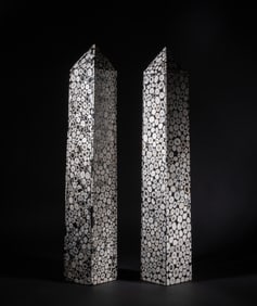 Two Mid-century Tall Snowflake Obelisk