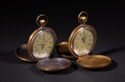 Two Enameled Brass Pocket Watches