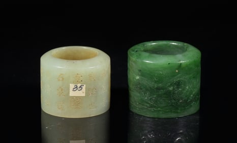 Two Chinese Jade Thumb Rings