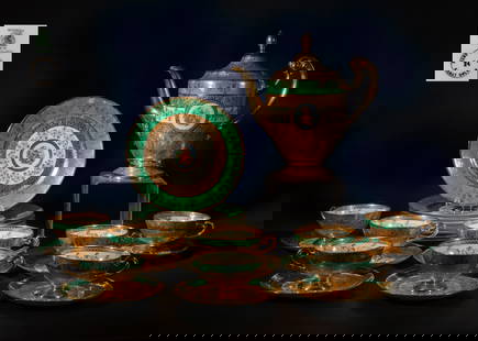 Vintage 24K Gold Filled Porcelain Pieces: Large set of vintage 24K gold filled porcelain plates, tea cups, saucers and a tea pot, decorated with complicated floral motif and figural scene, each piece bottom marked BOHEMIA Made in Czechoslovak