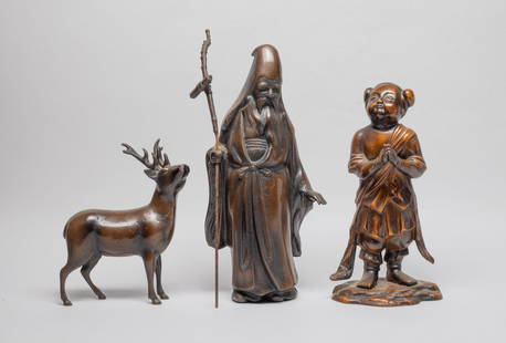 Vintage Japanese Painted Metal Sculptures: Three vintage Japanese painted metal table sculptures, cast in elk, boy or old man form. Approx. 13.3*4.5*3.5 inch (largest).