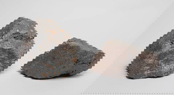 Two Heavy Meteorite Like Stones: Two heavy meteorite-like stone sculptures. Approx. 4*4.7*3.6 inch (larger).
