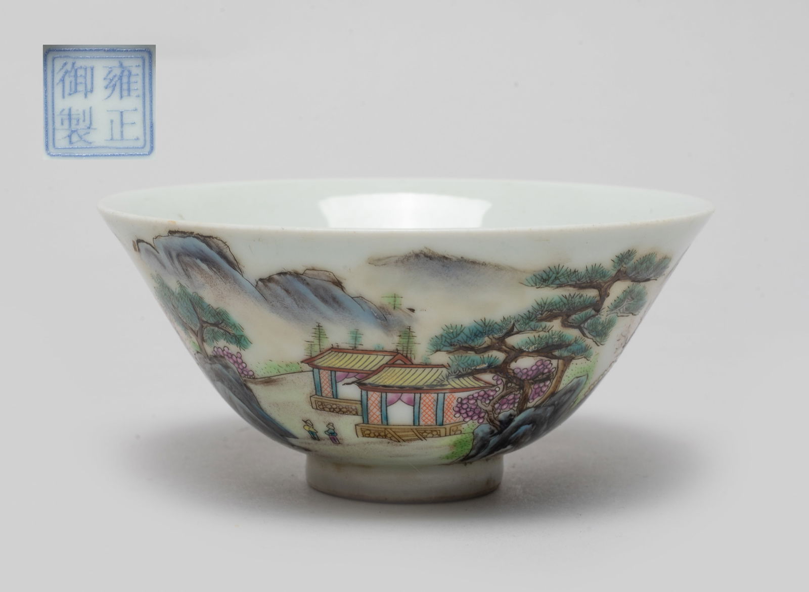 Chinese Export Porcelain Tea Cup: The cup exterior decorated with continuous mountain and river landscape scene, with a seal mark on the bottom. Approx. 3.7*1.7 inch.