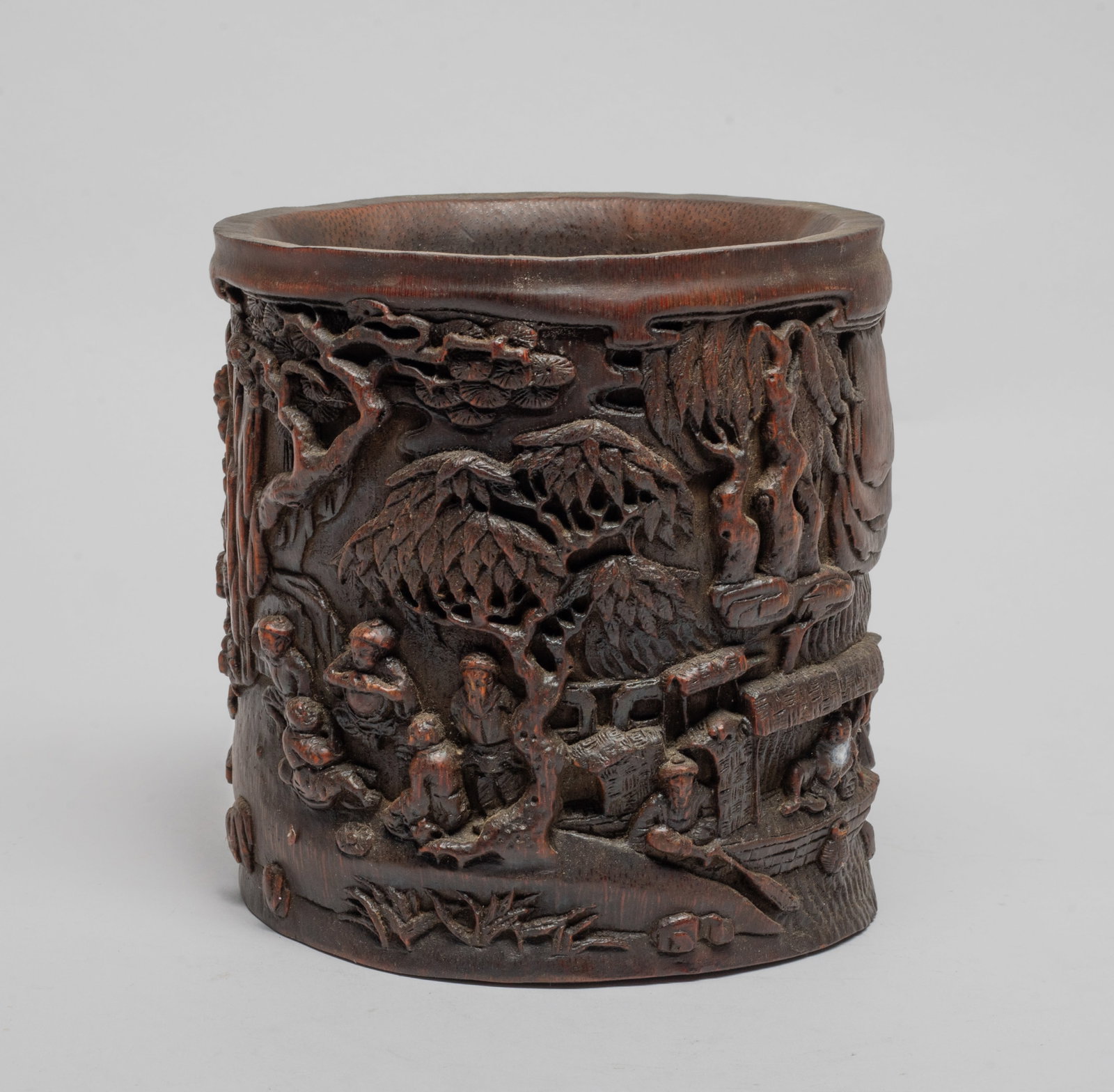 Estate Chinese Bamboo Carved Brush Pot: Of cylindrical form, the exterior carved with figures sitting under tree and figures on boat in landscape setting. Approx. 5.8*5.5 inch.
