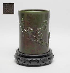 Estate Chinese Spinach Jade Like Brush Pot: Of cylindrical form, the exterior carved in raised relief with birds and gnarled flower tree branches, inscribed with related poems, with stand. Approx. 3.9*5 inch (w/o stand).