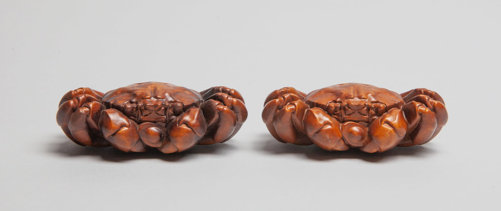 Two Chinese Boxwood Carved Sculptures: Two special Chinese boxwood carved crab form sculptures. Approx. 2.74*1.4*1 inch (larger).