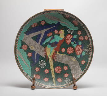 Large Japanese Antique Edo Cloisonne Charger: The charger interior enameled with a bird on a flower tree on deep blue background suffused scrolls, the exterior enameled butterflies and flowers, with stand. Approx. 14.5 inch D (w/o stand).