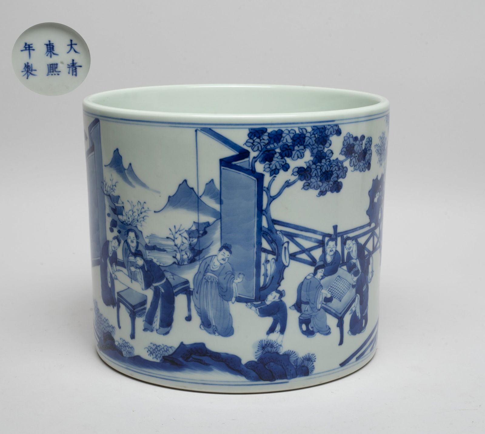 Chinese Blue & White Porcelain Brush Pot: Of cylindrical form, the exterior painted with a continuous figural scene, inscribed with related passages, the bottom marked with six characters. Approx. 7.8*6.7 inch.