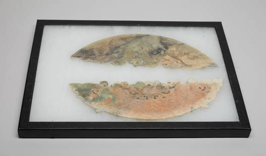 Two Large Chinese Jade/ Stone Carvings: One of arching thin section and terminating in archaistic beast heads on either end, displaying raised spirals on both sides above openwork scrolling beasts, the other of arch section carved with anim