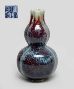 Chinese Flambe Glazed Porcelain Vase: Of double gourd form with three columnar necks, the exterior applied in crackled deep purple glaze thinning to white hue at the mouth, suffused with milky blue streaks, the bottom marked with six char