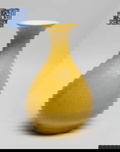 Estate Chinese Yellow Glazed Porcelain Vase: Of pear shape rising from a short foot to a waisted neck with a flared rim, the exterior covered in mottled yellow glaze suffused with a matrix of crackles, the bottom inscribed with a six-character m