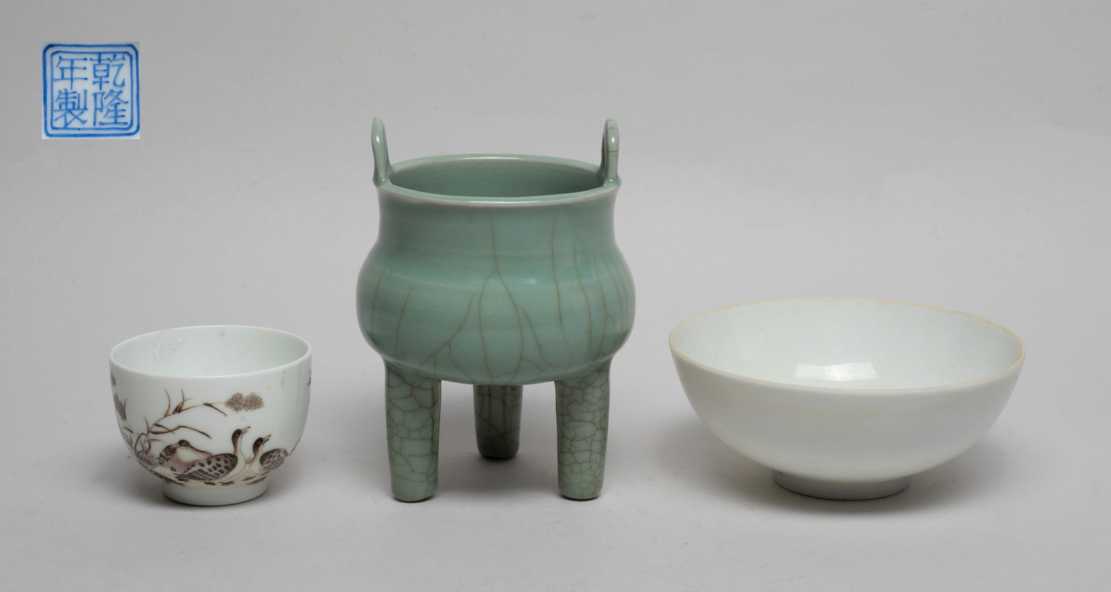 Estate Chinese Export Porcelains: Including a white glazed porcelain bowl, a tea cup painted with wild geese and reeds, inscribed with related passages, the bottom with a seal mark, and a censer applied in celadon glaze with a matrix
