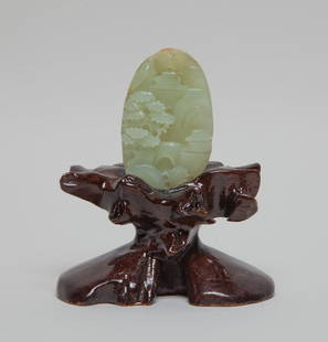 Estate Chinese Export Jade on Stand: Chinese pale celadon and russet jade pebble sculpture, carved in multiple layers of relief with mountain landscape, with pavilions, bridge and pine trees, attached on a stand. Approx. 3.9*3.4*1.8 inch