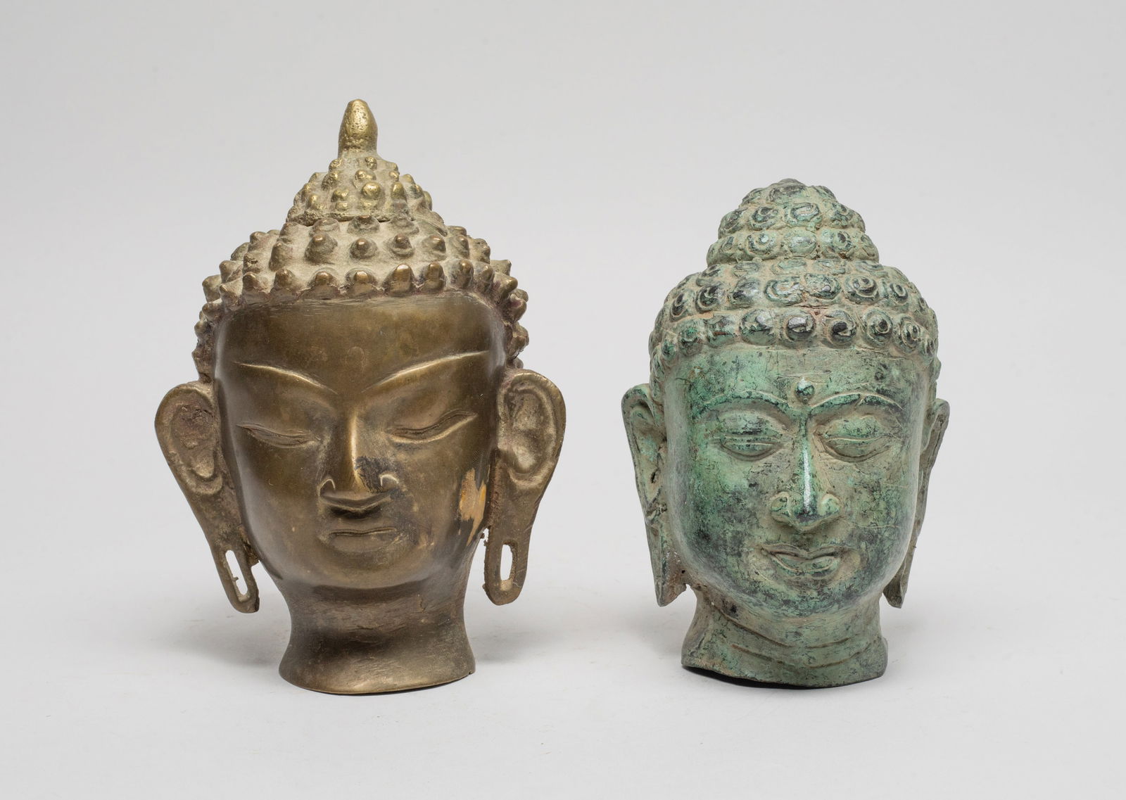 Two Asian Bronze Buddha Head Sculptures (1 of 14)