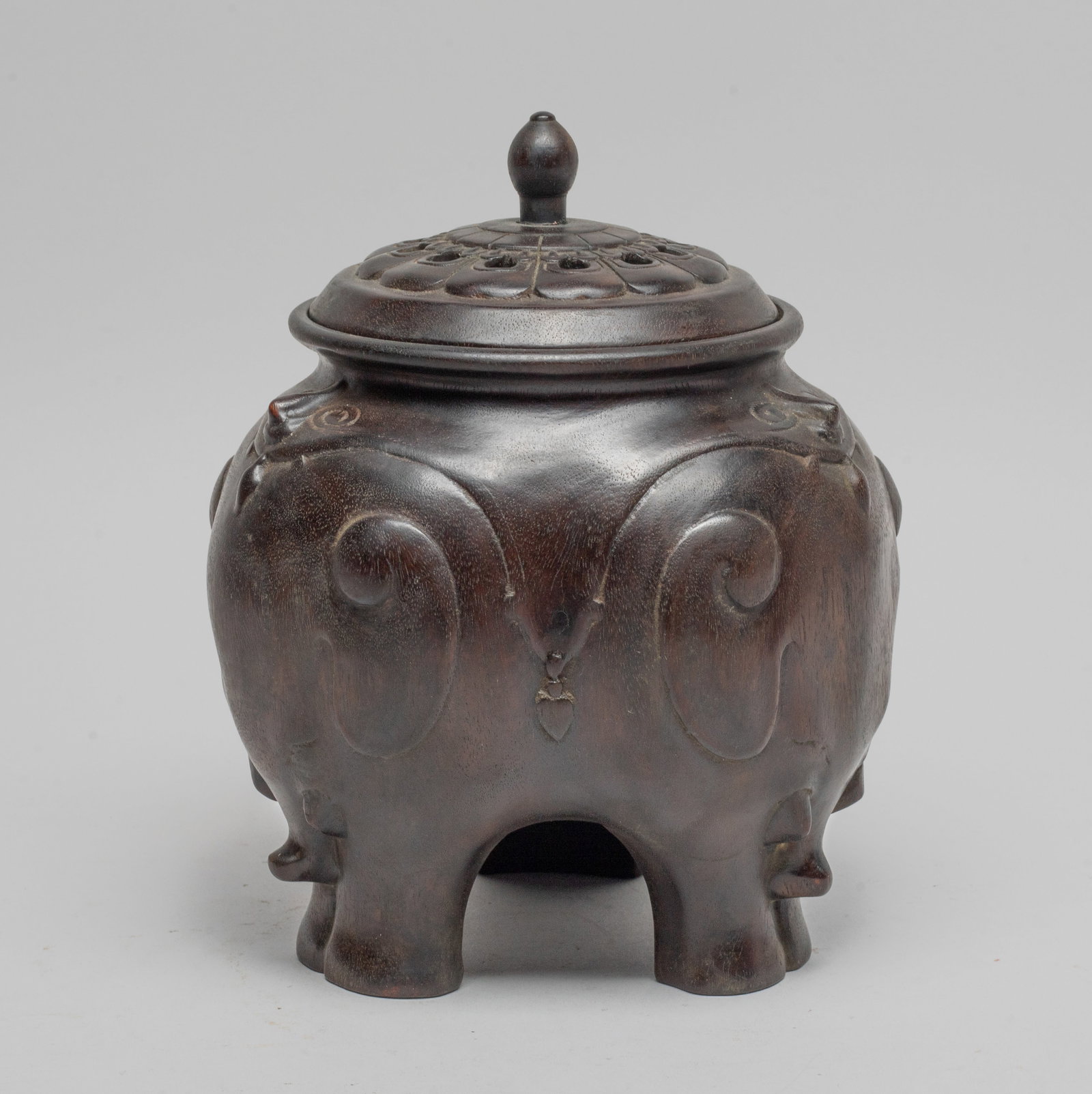 Asian/ Chinese Bark of Agarwood Censer: The censer body of trilobed form, each side carved with an elephant, the lid carved in openwork of lotus form. Approx. 7*5.6 inch.