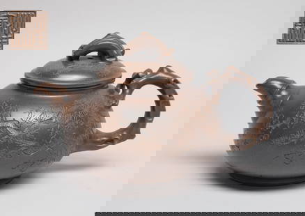 Estate Chinese Yixing Zisha Tea Pot: The tea pot body incised with pine tree, plum blossom tree and bamboo, the handle and lid finial worked in branch form and the spout in bamboo form, the lid interior carved with two marks, and the pot