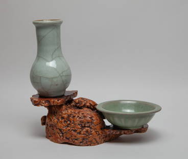 Two Chinese Export Porcelains w/ Wood Base: The porcelain vase overall covered in gray glaze with a matrix of brown crackles, the dish interior carved with a pair of fish, the exterior with a band of overlapping lotus petals, covered in bubbled
