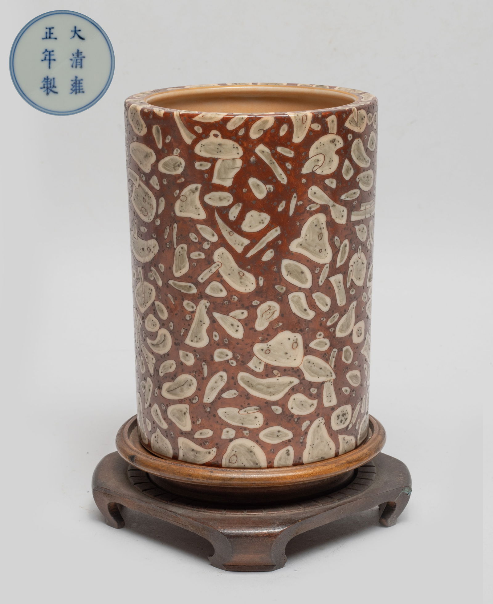 Chinese Porcelain Brush Pot: Of cylindrical form, the exterior decorated with special motif, the interior glazed in soft salmon color, the bottom marked with six characters enclosed in double circles, with stand. Approx. 5.5*4 in