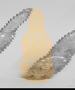 Chinese Crystal/ Peiking Glass Kuanyin Sculpture: The Kuanyin carved seated on a lotus throne, the hands in dhyana mudra holding a bottle, wearing a loose-fitting robe, the rounded face with serene expression. Approx. 4.7*2.2*1.6 inch.