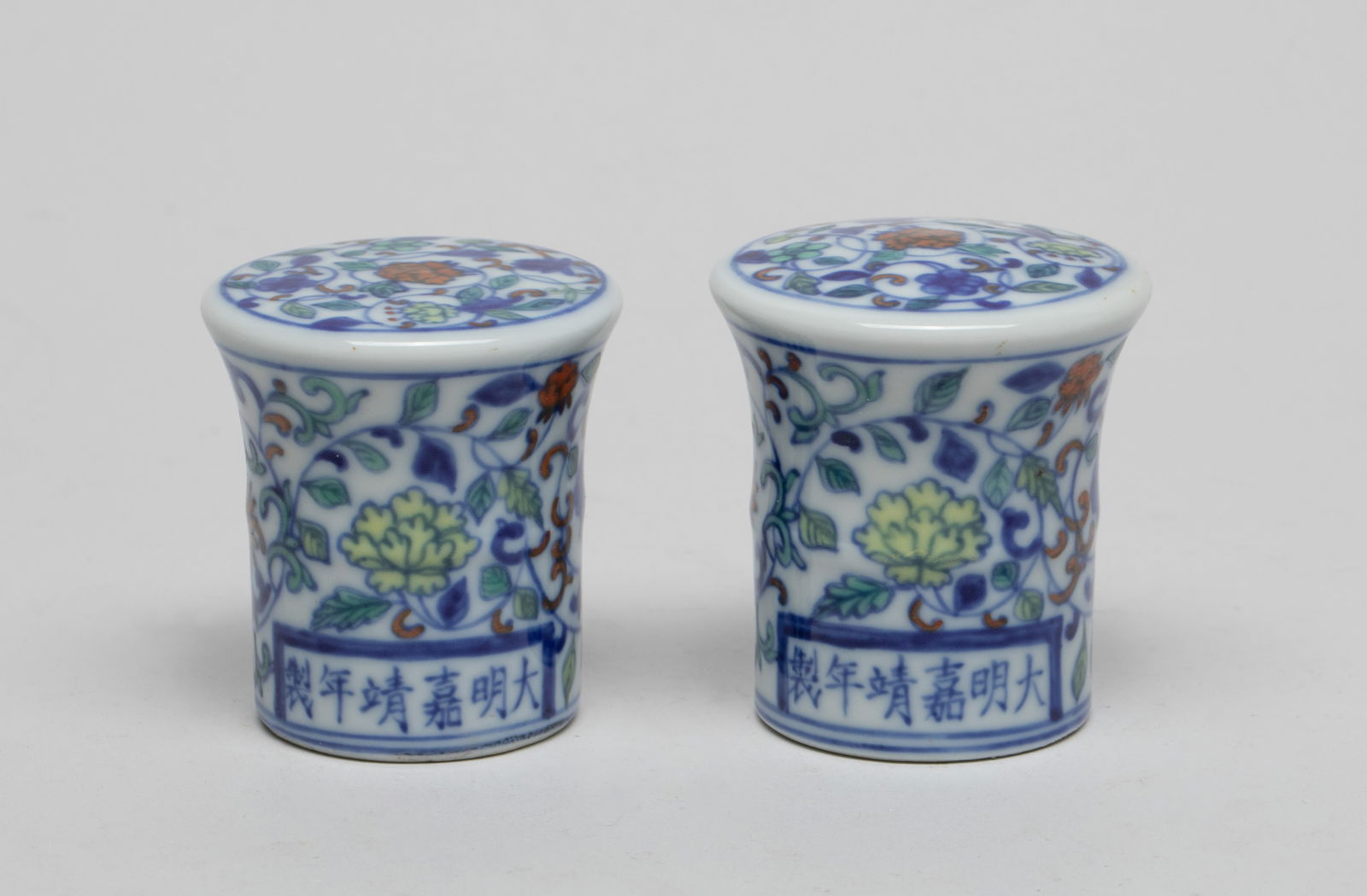 Estate Chinese Porcelain Painting Finials: Both finials painted with meandering leafy lotus foliage, marked with six characters on the foot rim. Approx. 2.3*2.1 inch (larger).