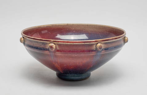 Chinese Jun Type Porcelain Large Bowl: The bowl inside and out unctuously covered with a glossy crushed rasberry-coloured glaze highlighted by lavender-blue streaks, the rim set with a border of raised bosses. Approx. 7.6*3.3 inch.