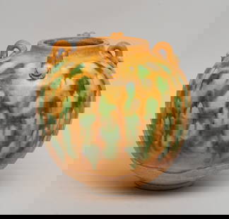 Estate Chinese Sanchai Porcelain Jar: Of ovoid form set on the upper body with four raised handles, the exterior applied with beige, brown and green glaze suffused with glazed crackles, stopping at the unglazed lower body. Approx. 6*6 inc