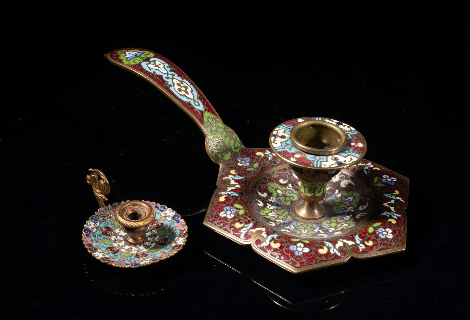 19th France Antique Enameled Pieces: Two antique / vintage candlestick holders, each enameled with delicate foliage scrolls, against red or blue background. Approx. 7.5*3.7*1.9 inch (larger).