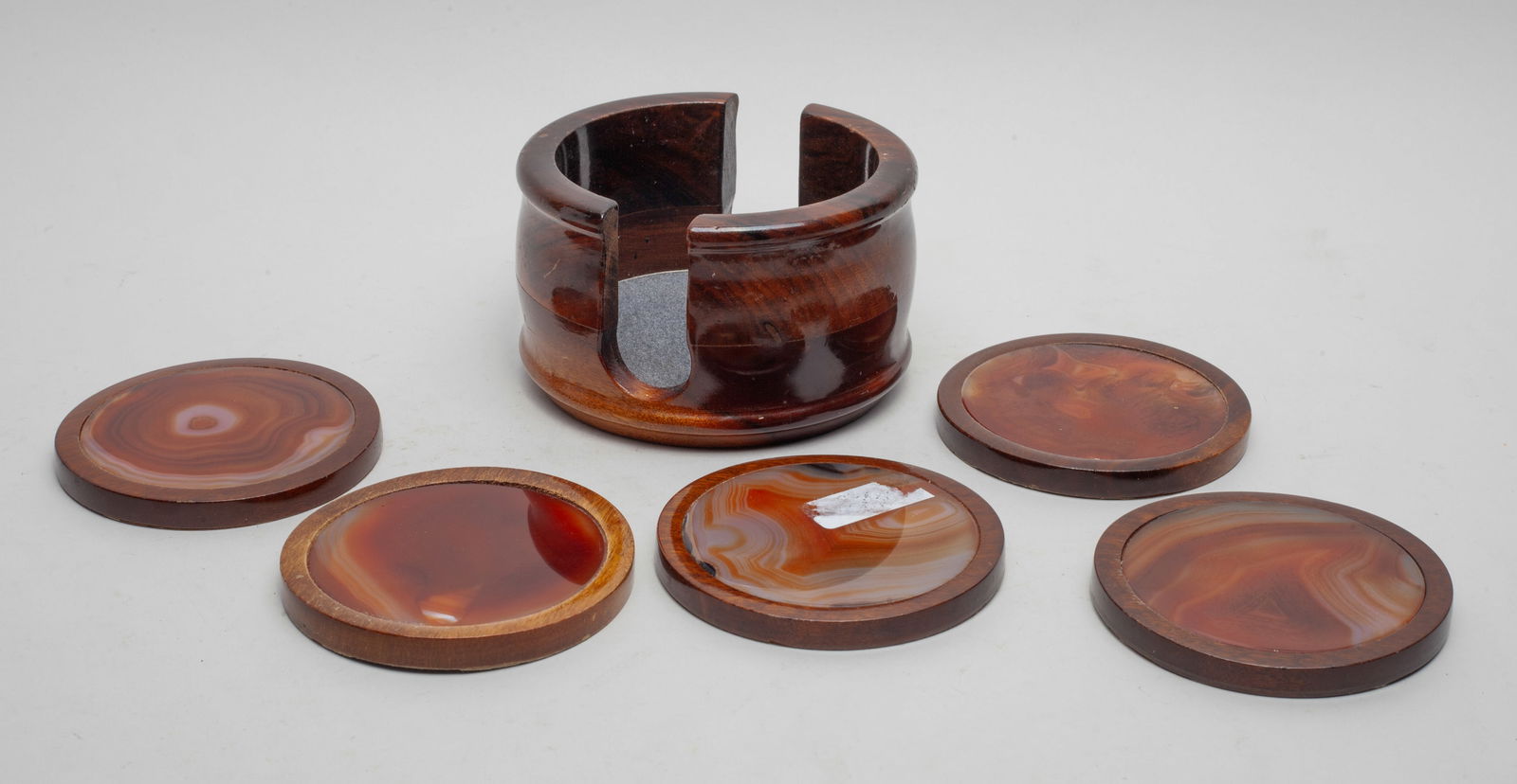 Vintage Carnelian Banded Agate Cup Stands: Set of 5 vintage Carnelian banded agate cup stands of circular shape, with case. Approx. 4.8*2.9 inch (case size).