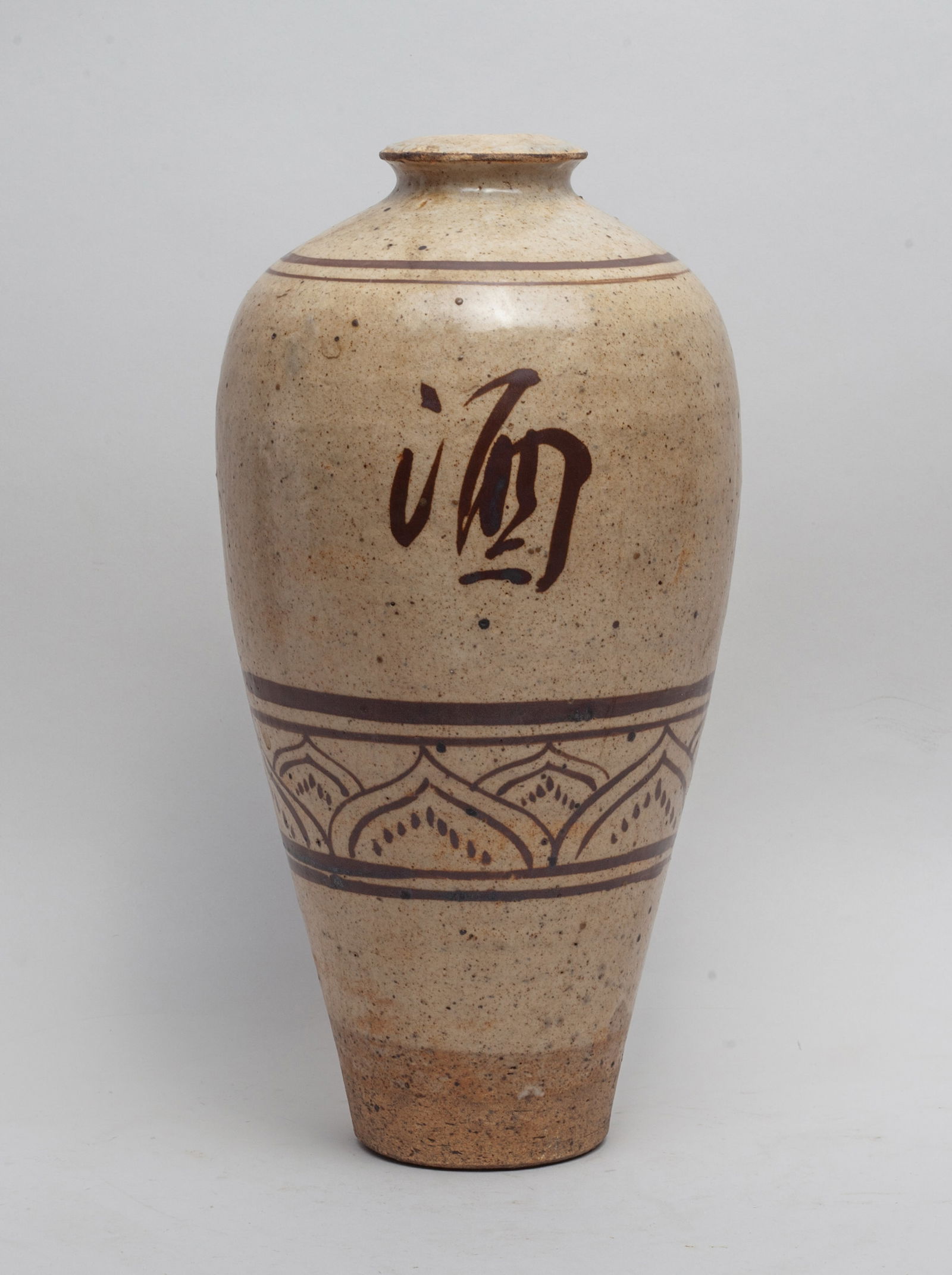 Chinese Cizhou Stoneware Vase: Of baluster form, the exterior decorated with a Jiu character and a flower, above a band of overlapping petals. Approx. 11.7*5.8 inch.