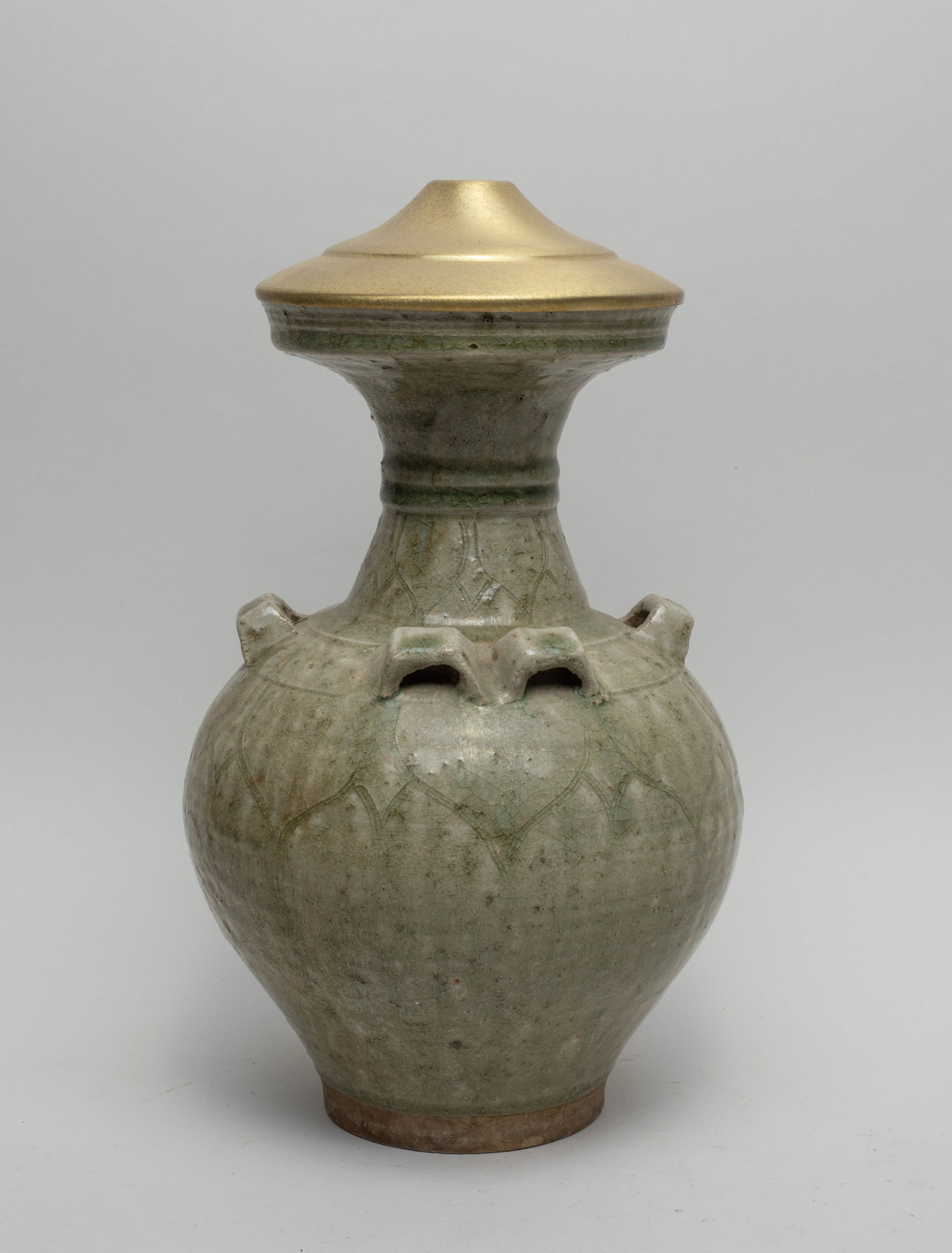 Chinese Yue Ware Porcelain Large Vase: The tapered ovoid form rising to a waisted neck and a dished rim, carved in low relief with overlapping lotus petals, set with six raised handles and a metal lid, covered the exterior in crackled cela