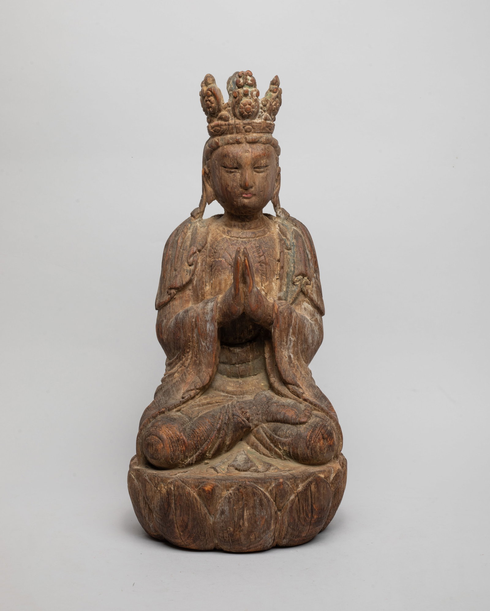 Chinese Wood Carved Sculpture of Buddha: The wood Buddha carved seated on a lotus base, the hands in namaskara mudra, wearing a loose-fitting robe and an elaborate throne. Approx. 15.7*7.3*3.7 inch.