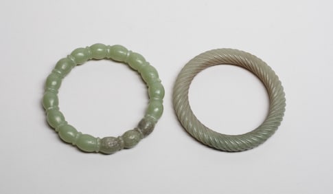 Two Chinese Jade Carved Bangles