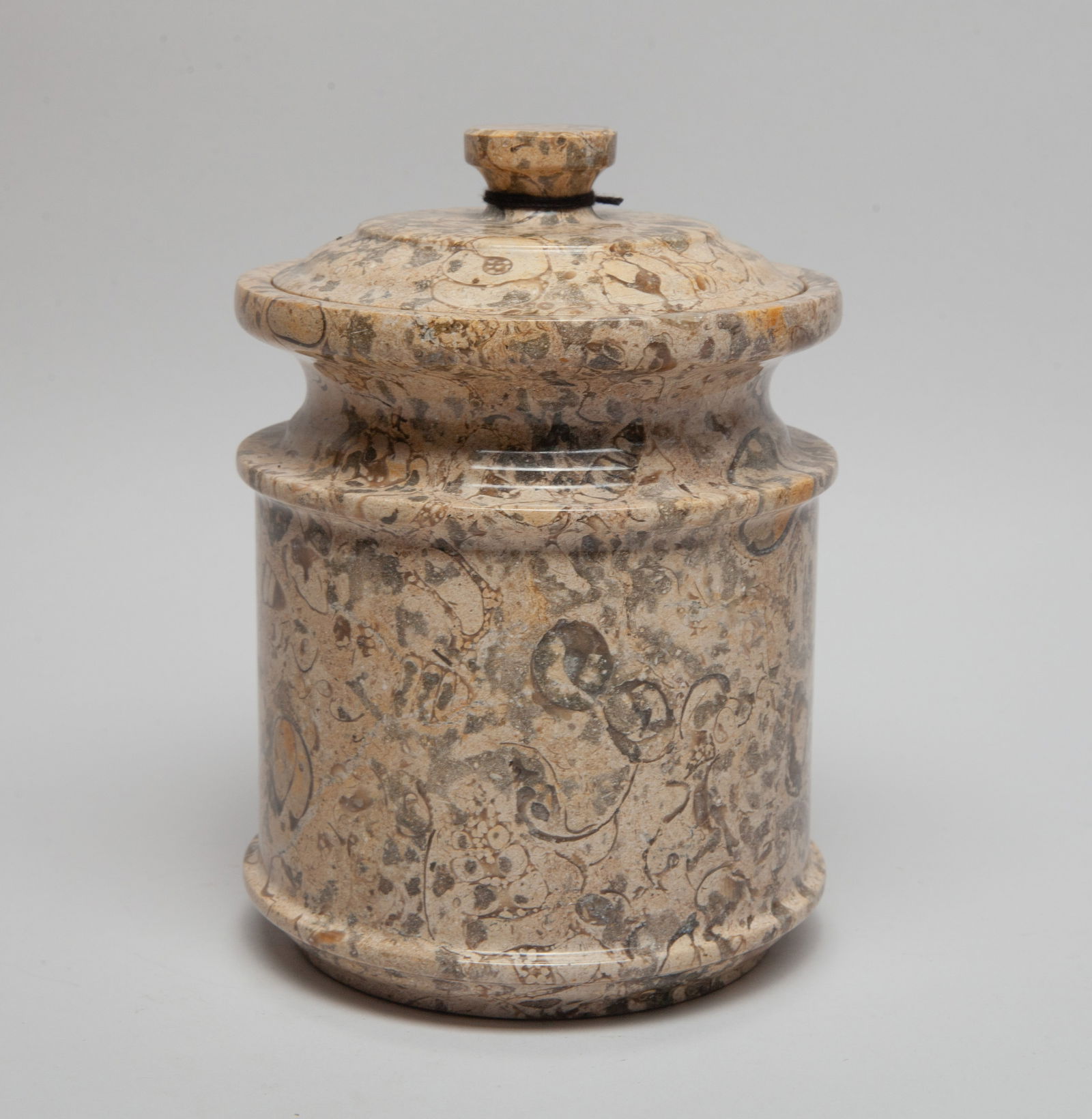 Vintage Fossil Carved Jar: Collectible fossil carved covered jar. Approx. 6.8*4.9 inch.