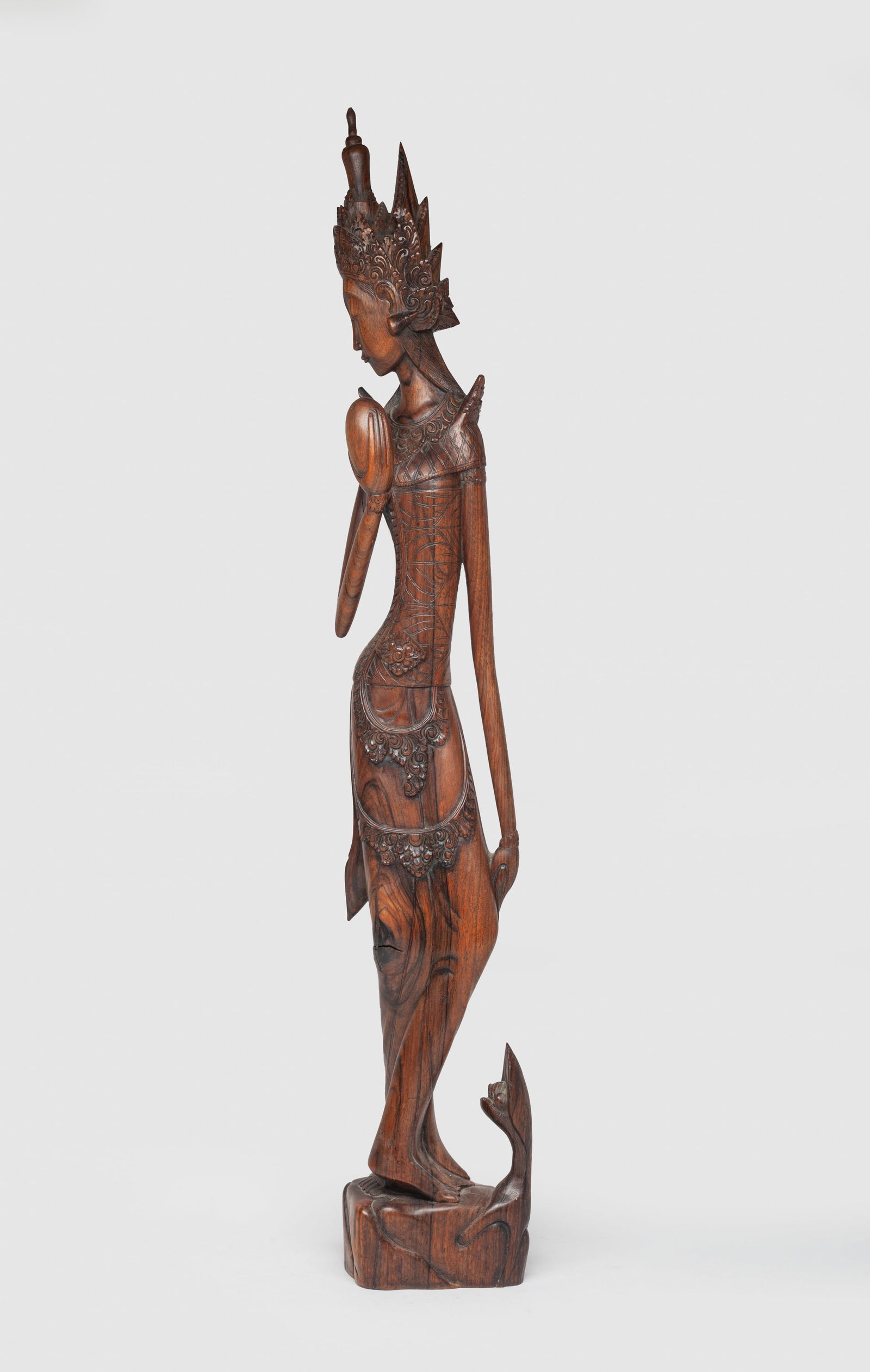Tall Vintage South Asian Iron Wood Sculpture: Tall rare South Asian iron wood carved figurine sculpture, her head turned to the left wearing a delicate diadema. Approx. 28.2*4.3*2.8 inch.