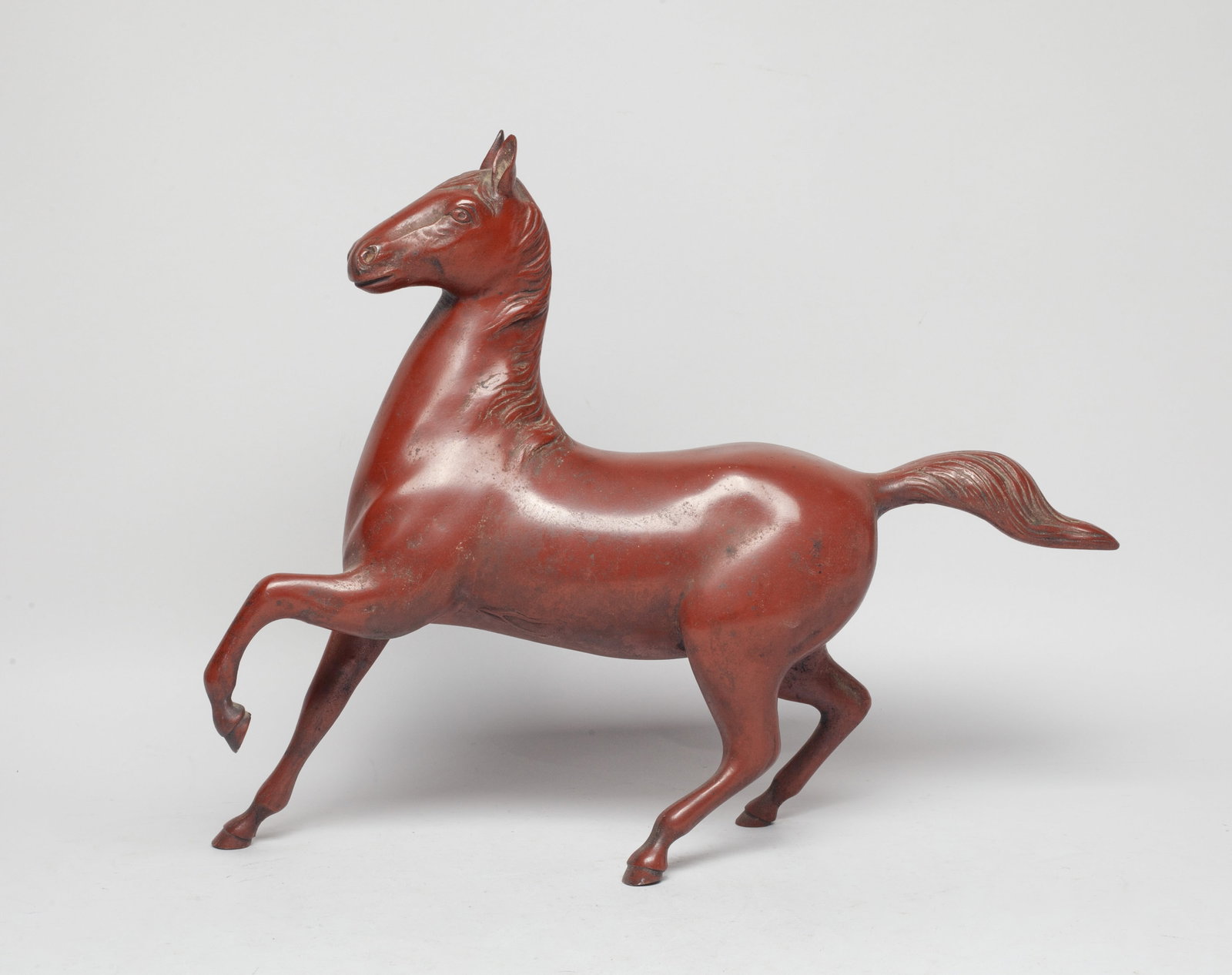 Mid-century Painted Metal Sculpture: Painted metal room decor sculpture, moulded in horse form. Approx. 11.5*14.7*3.6 inch.