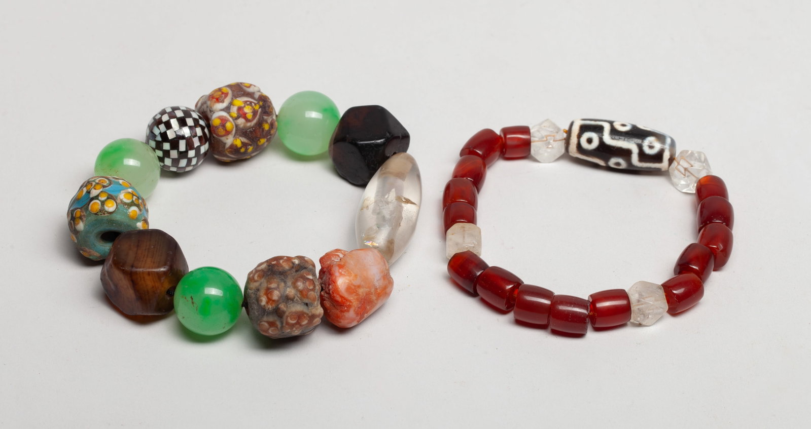 Estate Chinese Mixed Prayer Beads: Two strings of Chinese mixed prayer beads, comprised of glass, stone, and decor beads. Approx. 1.65*0.7 inch (largest bead).