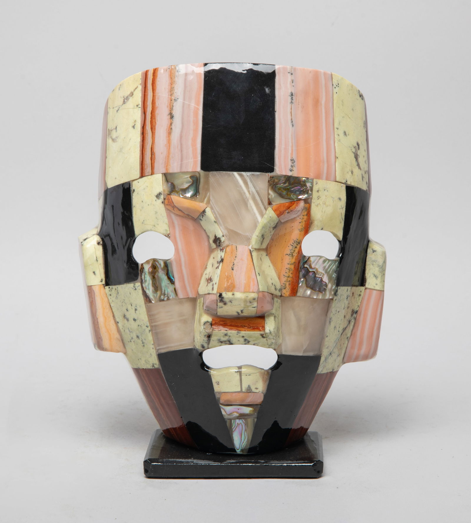 Vintage Aztec Gemstone Mask Sculpture: Vintage Aztec mask sculpture inlaid with gemstone. Approx. 8.2*6.4*3.2 inch.